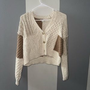Brown and white cropped sweater.
